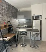 Miniature 1