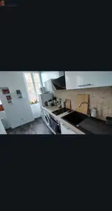 Miniature 1