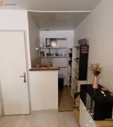 Miniature 1